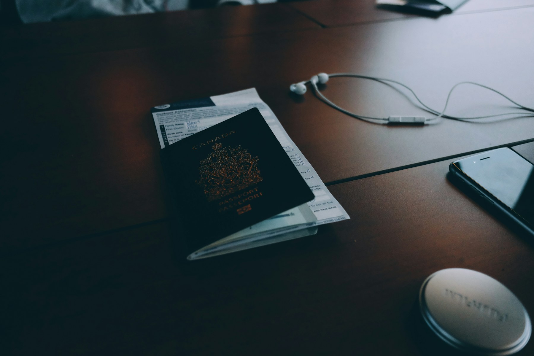 Generic passport arranged with travel items; no personal details are visible